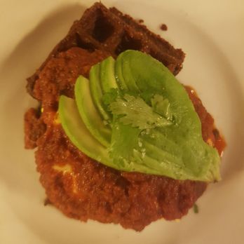 The Smith - Ranchero eggs: cornbread, eggs with tomato sauce and avocado. - New American Near Me - New York, New York