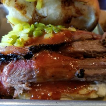 Dinosaur Bar-B-Que - Original BBQ Brisket sandwich (Sandwich close-up) - Barbeque Near Me - Rochester, New York Dinosaur Bar-B-Que - Original BBQ Brisket sandwich (Sandwich close-up) - Barbeque Near Me - Rochester, New York