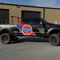 Premier Security - Premier Security Inc service truck