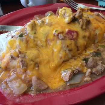 Sam's No 3 - Kitchen sink burrito: eggs, bacon, ham, sausage, gyro, onion, bell pepper, tomato, mushrooms, cheddar & Pork Green Chili - Breakfast & Brunch Near Me - Denver, Colorado Sam's No 3 - Kitchen sink burrito: eggs, bacon, ham, sausage, gyro, onion, bell pepper, tomato, mushrooms, cheddar & Pork Green Chili - Breakfast & Brunch Near Me - Denver, Colorado