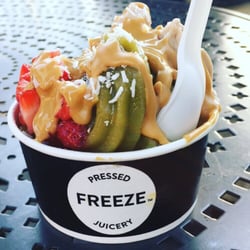 Pressed Juicery - Green/Vanilla combo with strawberries, coconut shreds, and almond butter