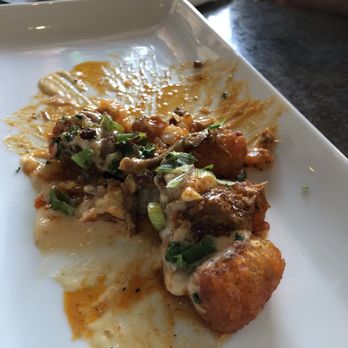 Gentelin's On Broadway - What was left of the amazing buffalo tots once I remembered to take a picture! They were basically gourmet bar food and we wanted more! - New American Near Me - Alton, Illinois