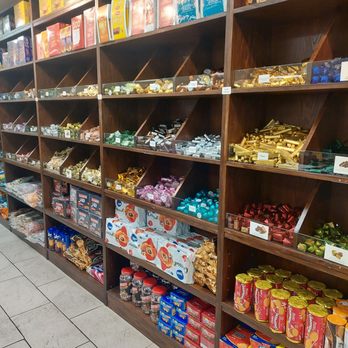 The Golden Nuts - Wall of chocolate sold by the pound - Desserts Near Me - Columbia Heights, Minnesota