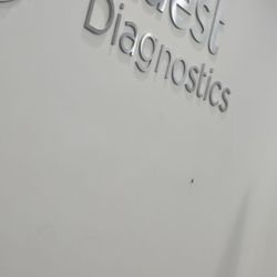 Quest Diagnostics - A ROACH crawling on the wall.!