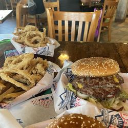 Babe's Old Fashioned Food - Huge double cheeseburger greasy hands large portion of fries and rings  Soda is EXPENSIVE . Paid about 23.00 a piece