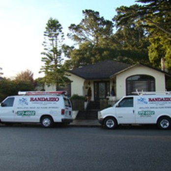 Randazzo Hardwood Floors - two vans parked in front of a house - Flooring Near Me - Monterey, California Randazzo Hardwood Floors - two vans parked in front of a house - Flooring Near Me - Monterey, California