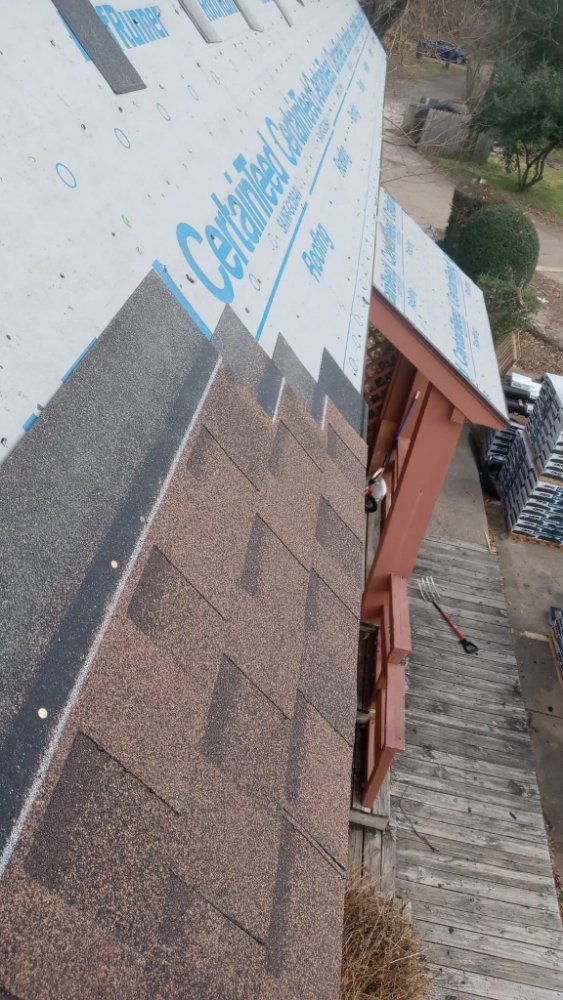 Slide of Top Tex Roofing