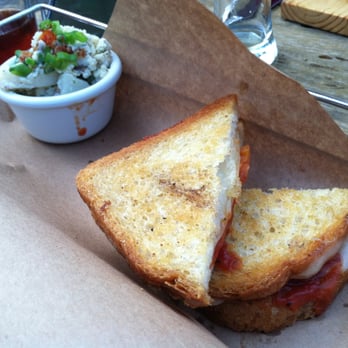 Idle Hour Biergarten - Bavarian Grilled Cheese with German Potato Salad - Bars Near Me - Atlantic Beach, North Carolina Idle Hour Biergarten - Bavarian Grilled Cheese with German Potato Salad - Bars Near Me - Atlantic Beach, North Carolina