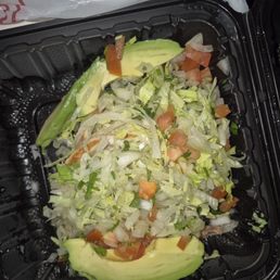 Two vegan sopes. Underneath all the lettuce. Two vegan sopes. Underneath all the lettuce.