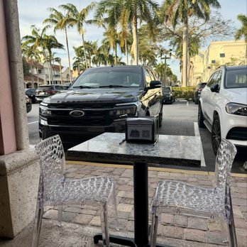 Pzza& - View from my table while waiting for my Togo order. - Pizza Near Me - Boca Raton, Florida Pzza& - View from my table while waiting for my Togo order. - Pizza Near Me - Boca Raton, Florida