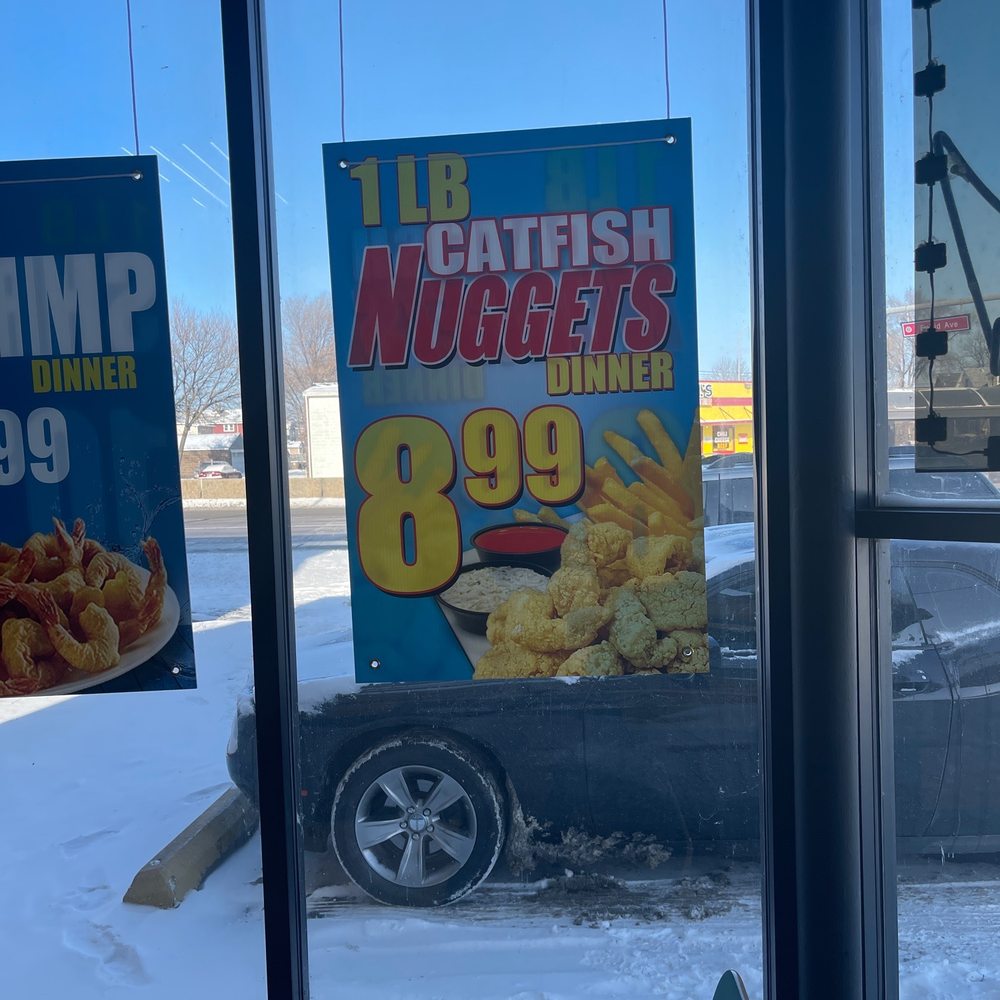 Sharks - a fish and chips sign in the window of a fast food restaurant - Seafood Near Me - East Chicago, Indiana Sharks - a fish and chips sign in the window of a fast food restaurant - Seafood Near Me - East Chicago, Indiana