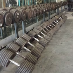 The Den Fitness - Iron Dens Iron weights from 10 lbs to 150 lbs dumb bells. Dropping weights and grunting allowed!