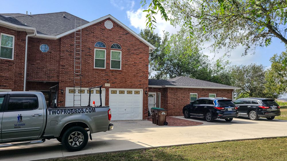 Slide of Two Brothers Roofing