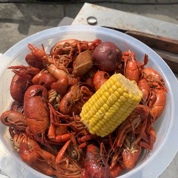 ‘Til We Run Out -  a plate of boiled craws and corn - Cajun/Creole Near Me - Alabaster, Alabama