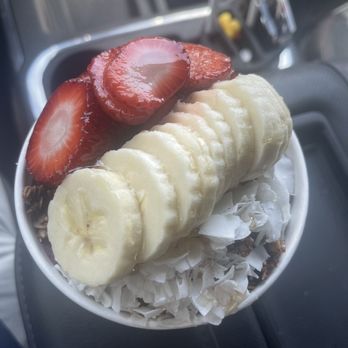 Kuka Juice - strawberries, bananas, and coconut flakes in a bowl - Juice Bars & Smoothies Near Me - Greenville, South Carolina Kuka Juice - strawberries, bananas, and coconut flakes in a bowl - Juice Bars & Smoothies Near Me - Greenville, South Carolina
