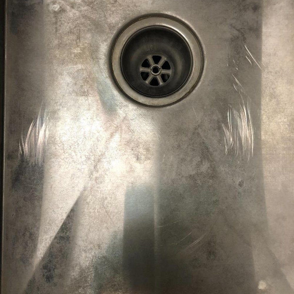 Sewage Pros - Scratched kitchen sink with grout - Plumbing Near Me - Hampton, Virginia Sewage Pros - Scratched kitchen sink with grout - Plumbing Near Me - Hampton, Virginia