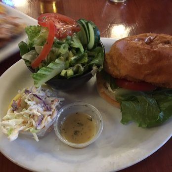 The Firepit BBQ Smokehouse - Fish burger and side salad - Barbeque Near Me - Golden, British Columbia The Firepit BBQ Smokehouse - Fish burger and side salad - Barbeque Near Me - Golden, British Columbia