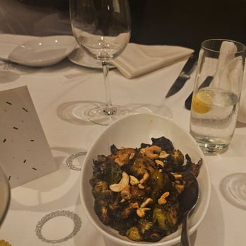Eddie V's Prime Seafood - Honey Sriracha Brussels Sprouts w/cashews - Seafood Near Me - Cherry Hill, New Jersey Eddie V's Prime Seafood - Honey Sriracha Brussels Sprouts w/cashews - Seafood Near Me - Cherry Hill, New Jersey