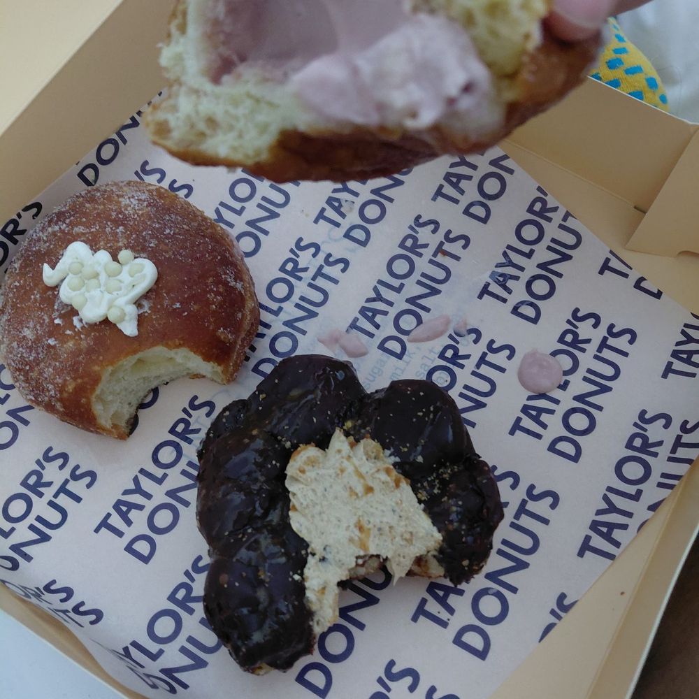 Taylor's Donuts - Creme filling of each donut (top to bottom) Raspberry Passionfruit guava Smores - Coffee & Tea Near Me - Lawrence, Kansas Taylor's Donuts - Creme filling of each donut (top to bottom) Raspberry Passionfruit guava Smores - Coffee & Tea Near Me - Lawrence, Kansas
