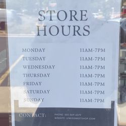 Lewis Sweet Shop - Store Hours available in the front window.