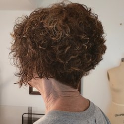 Loressence Studio - Layered diagonal forward bob with short undercut on nape area and feathered fringe.