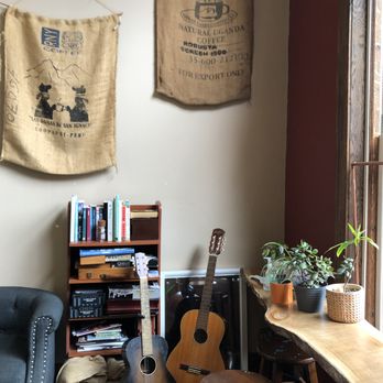 Mugshots - The 2 guitars in the back alcove of the cafe. - Cafes Near Me - Wheeling, West Virginia