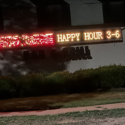 The Blue Iguana Bar And Grill - The sign that does not specify Wednesday only for happy hour!