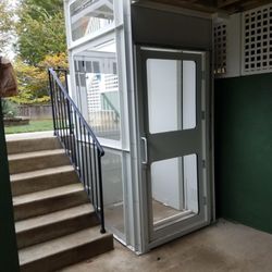 Solano Mobility & Accessibility - wheelchair lift with enclosure at the lower landing