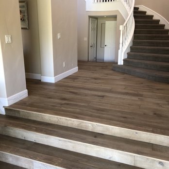 Viking Flooring - a staircase leading to a second floor - Flooring Near Me Viking Flooring - a staircase leading to a second floor - Flooring Near Me