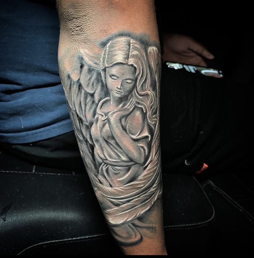 Tattoos by Dorian Logo