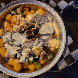 PS Tavern - Philly cheesesteak on tater tots. Genius!