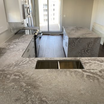 Stone Savvy - Excava Caesarstone Waterfall - Kitchen & Bath Near Me - Casselberry, Florida Stone Savvy - Excava Caesarstone Waterfall - Kitchen & Bath Near Me - Casselberry, Florida
