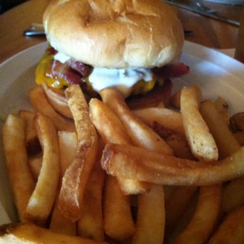 Pheasant Restaurant & Lounge - Bacon, Cheddar and Bleu Burger with fries - New American Near Me - Brookings, South Dakota Pheasant Restaurant & Lounge - Bacon, Cheddar and Bleu Burger with fries - New American Near Me - Brookings, South Dakota