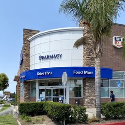 the front of a pharmacy store the front of a pharmacy store