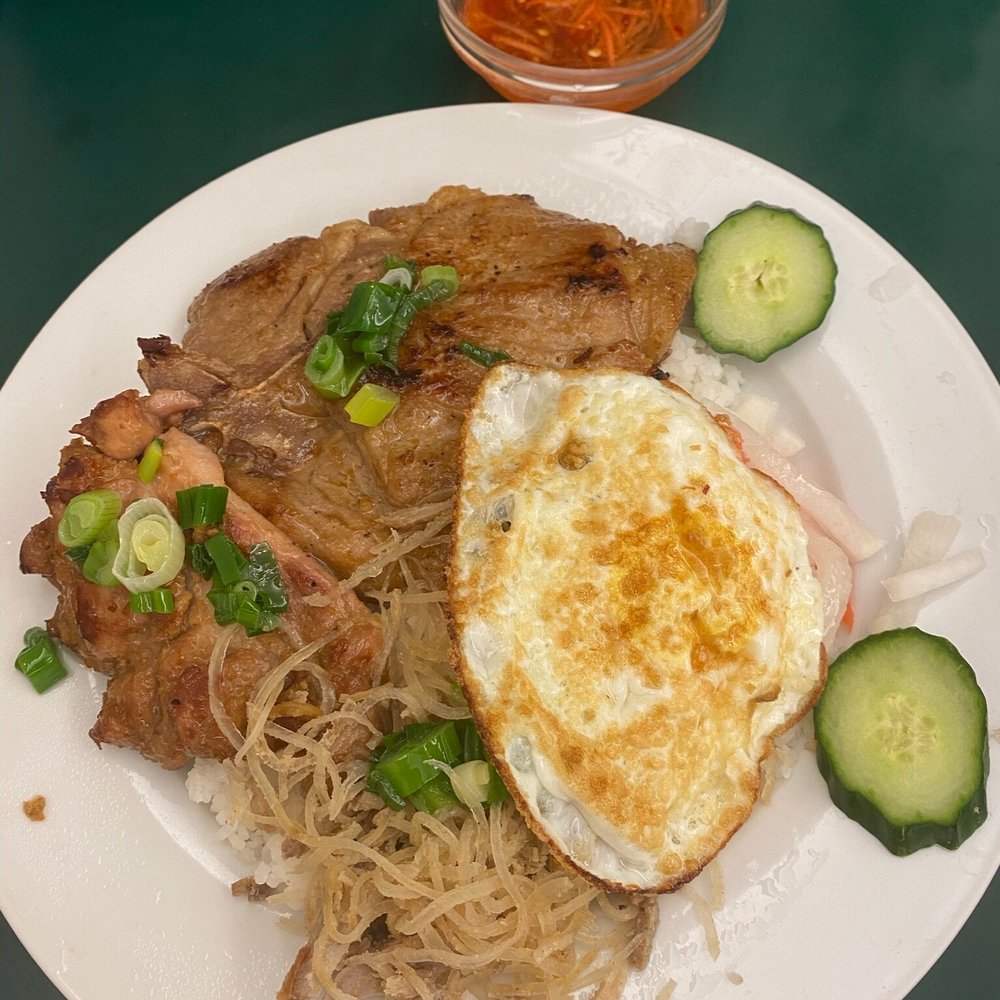 Pho Nhuan - Grilled lemon grass chicken & shredded pork with an egg on steamed broken rice - Vietnamese Near Me - Vancouver, British Columbia Pho Nhuan - Grilled lemon grass chicken & shredded pork with an egg on steamed broken rice - Vietnamese Near Me - Vancouver, British Columbia