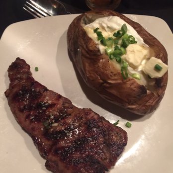 Feeney's Restaurant and Bar - New New York Strip with loaded baked potatoes! - Bars Near Me - Phoenix, Arizona