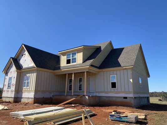 Rico’s Roofing Restorations Logo