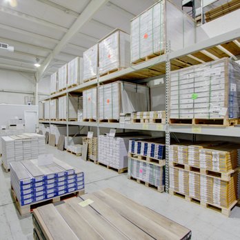 Shoreline Flooring - a warehouse with pallets and boxes - Carpeting Near Me - Myrtle Beach, South Carolina Shoreline Flooring - a warehouse with pallets and boxes - Carpeting Near Me - Myrtle Beach, South Carolina