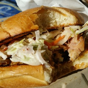 Tropics Island Grill - They didn't skimp on the meat in the pulled pork sandwich - pretty generous portion! - Food Trucks Near Me - Rockaway Beach, Oregon Tropics Island Grill - They didn't skimp on the meat in the pulled pork sandwich - pretty generous portion! - Food Trucks Near Me - Rockaway Beach, Oregon