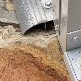 Example of poorly installed thresholds. Job was not complete, doors improperly installed, gutters not sealed (paid in advanced) Example of poorly installed thresholds. Job was not complete, doors improperly installed, gutters not sealed (paid in advanced)