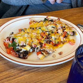 Little Brown Hen Cafe - Stuffed hash browns with all the meats and veggies. - Breakfast & Brunch Near Me - Florence, Oregon Little Brown Hen Cafe - Stuffed hash browns with all the meats and veggies. - Breakfast & Brunch Near Me - Florence, Oregon