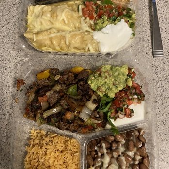 Taqueria La Familia - Top is the Enchilada Suiza, bottom is the steak fajita plate. - Mexican Near Me - Berkeley, California Taqueria La Familia - Top is the Enchilada Suiza, bottom is the steak fajita plate. - Mexican Near Me - Berkeley, California