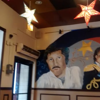 Amy Ruth's - Fun murals of important Black musicians decorate the walls. Festive lights and music help complement the relaxing, casual vibe. - Southern Near Me - New York, New York Amy Ruth's - Fun murals of important Black musicians decorate the walls. Festive lights and music help complement the relaxing, casual vibe. - Southern Near Me - New York, New York