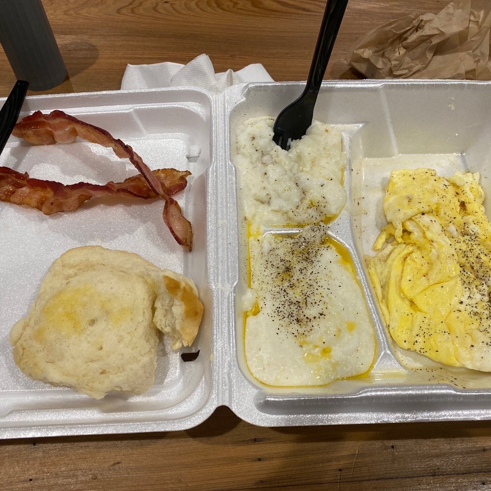 Two egg breakfast with bacon, grits, and biscuit. (Are some already) always hot, fast, and delicious! Two egg breakfast with bacon, grits, and biscuit. (Are some already) always hot, fast, and delicious!