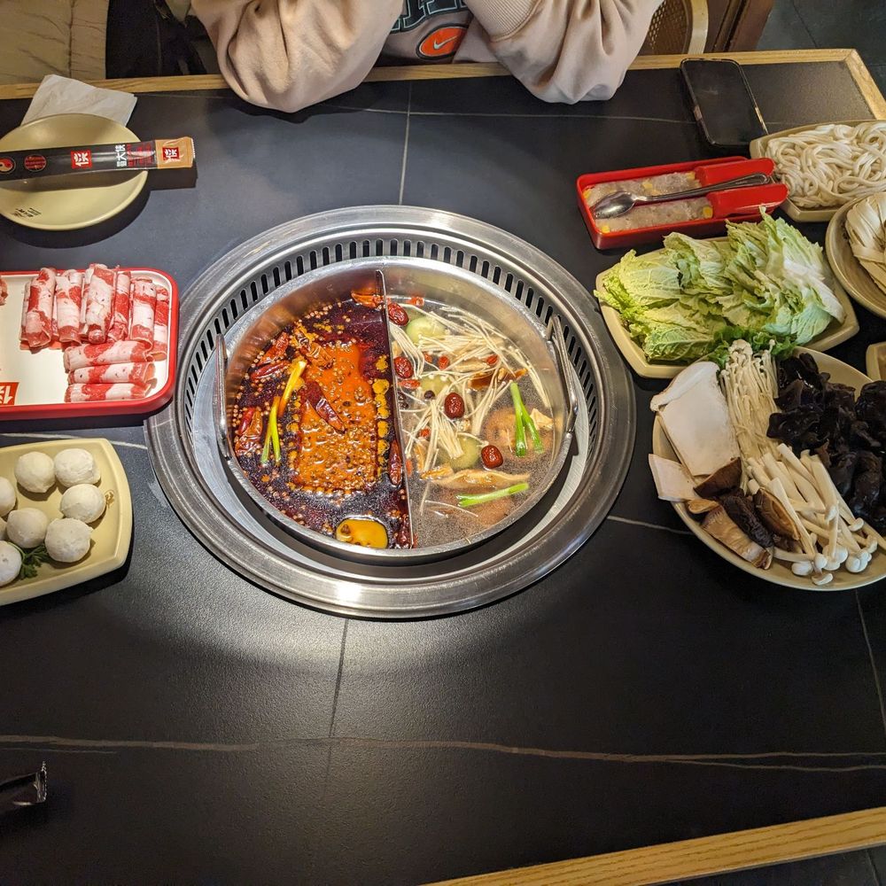 Pork belly & beef, fish balls, napa, mushroom platter, watercress, bean curd, udon, knife cut noodles Pork belly & beef, fish balls, napa, mushroom platter, watercress, bean curd, udon, knife cut noodles