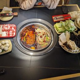 Pork belly & beef, fish balls, napa, mushroom platter, watercress, bean curd, udon, knife cut noodles