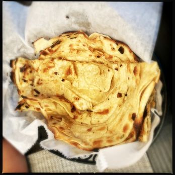 Paheli Indian Cuisine - Lachha parantha (flaky, multi-layered whole wheat Indian flatbread) - Indian Near Me - Wayne, New Jersey Paheli Indian Cuisine - Lachha parantha (flaky, multi-layered whole wheat Indian flatbread) - Indian Near Me - Wayne, New Jersey