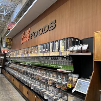 H-E-B - Bulk goodies - Bulk food dispensers filled with grains, nuts, and snacks are displayed at H-E-B grocery store in Lakeway, TX. - Drugstores Near Me - Lakeway, Texas
