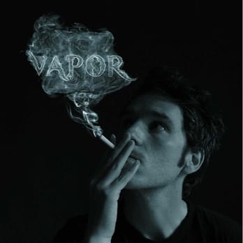 Vapor Cafe - a man smoking a cigarette - Hookah Bars Near Me - Herndon, Virginia Vapor Cafe - a man smoking a cigarette - Hookah Bars Near Me - Herndon, Virginia