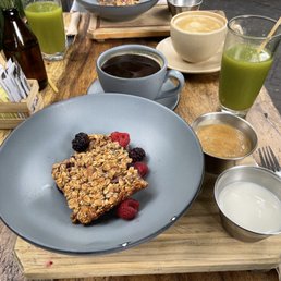 Barked oatmeal, green juice and coffee. Barked oatmeal, green juice and coffee.